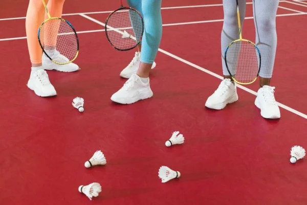 badminton players on court